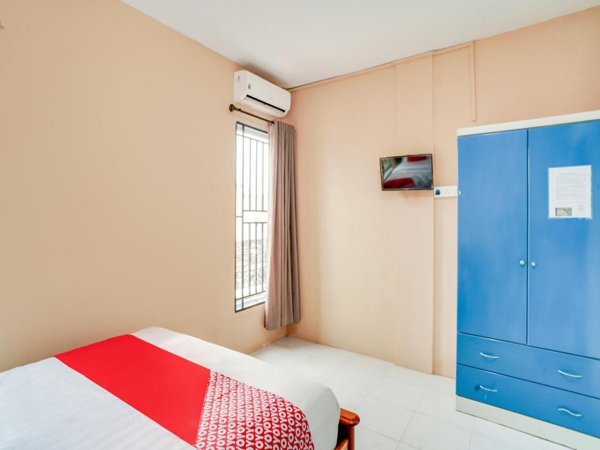 Oyo 90024 Botania Homestay & Cafe Nongsa Bagian luar foto